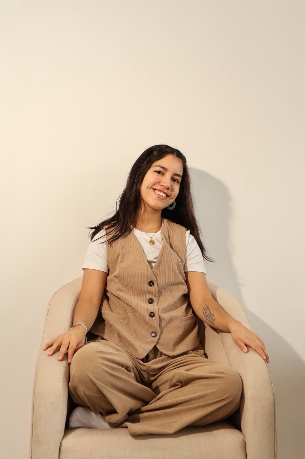 Ana María Reyes, clinical psychologist, seated in her office
